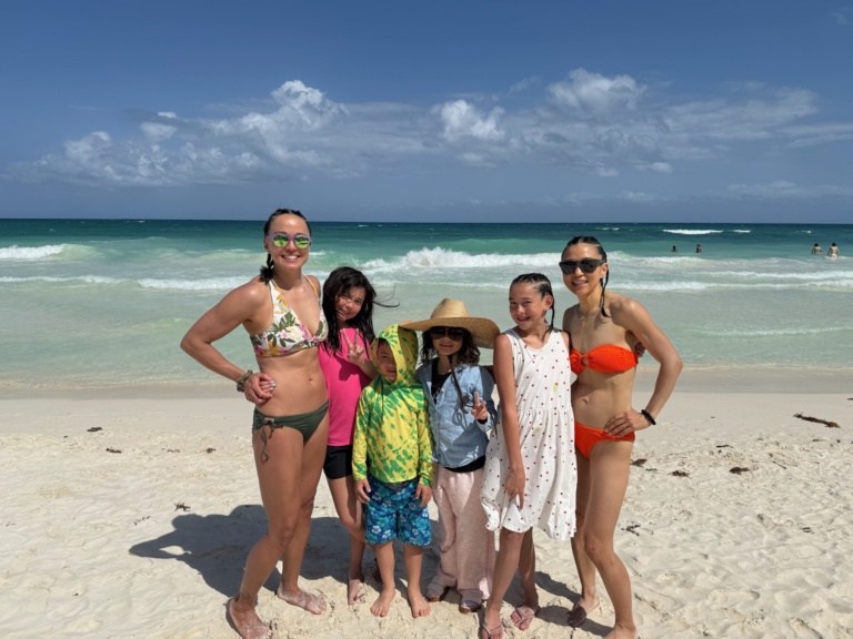 A group on a white sand beach